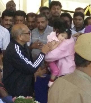 LtCol NiranjanKumar ‘s daughter,Vismay(2), consoled by relative & martyr’s father Shivarajan(black jacket) (Sudipto Mondol/HT) LtCol NiranjanKumar ‘s daughter,Vismay(2), consoled by relative & martyr’s father Shivarajan(black jacket) (Sudipto Mondol/HT)