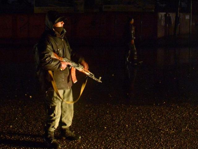 Afghan security personnel keep watch along a street after an unknown number of assailants mounted the attack from a building close to the Indian consulate in Mazar-i-Sharif, prompting Afghan forces to cordon off the area, late on January 3, 2016. (AFP) Afghan security personnel keep watch along a street after an unknown number of assailants mounted the attack from a building close to the Indian consulate in Mazar-i-Sharif, prompting Afghan forces to cordon off the area, late on January 3, 2016. (AFP)
