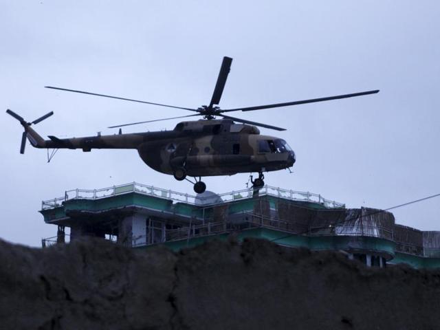 Afghan security forces surround a house which is used by a group of gunmen to attack on the Indian Consulate in Mazar-e-Sharif, capital of northern Balkh province, Afghanistan, Monday, Dec. 4, 2016. Officials said late Monday that the siege ended after all the attackers were killed. (AP) Afghan security forces surround a house which is used by a group of gunmen to attack on the Indian Consulate in Mazar-e-Sharif, capital of northern Balkh province, Afghanistan, Monday, Dec. 4, 2016. Officials said late Monday that the siege ended after all the attackers were killed. (AP)