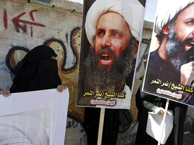 Iranian demonstrators chant slogans during a protest denouncing the execution of Sheikh Nimr al-Nimr, a prominent opposition Shia cleric in Saudi Arabia, seen in posters, in front of the Saudi Embassy, in Tehran. Western nation have reacted to the execution with France and Germany condemning it while the United States stressed the need for calm amid mounting tensions in the troubled region. (AP Photo) Iranian demonstrators chant slogans during a protest denouncing the execution of Sheikh Nimr al-Nimr, a prominent opposition Shia cleric in Saudi Arabia, seen in posters, in front of the Saudi Embassy, in Tehran. Western nation have reacted to the execution with France and Germany condemning it while the United States stressed the need for calm amid mounting tensions in the troubled region. (AP Photo)