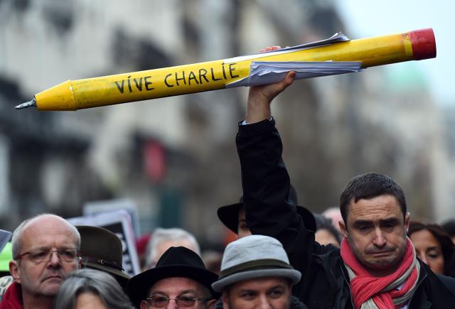 This file photo taken on January 11, 2015 shows people marching in Brussels in tribute to the 17 victims of the three-day killing spree in France that ended on January 9. (AFP)
