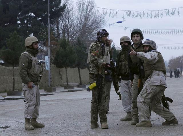 Afghan security personnel check a vehicle along a street after an unknown number of assailants mounted the attack from a building close to the Indian consulate in Mazar-i-Sharif, prompting Afghan forces to cordon off the area, late on January 3, 2016. (AFP) Afghan security personnel check a vehicle along a street after an unknown number of assailants mounted the attack from a building close to the Indian consulate in Mazar-i-Sharif, prompting Afghan forces to cordon off the area, late on January 3, 2016. (AFP)