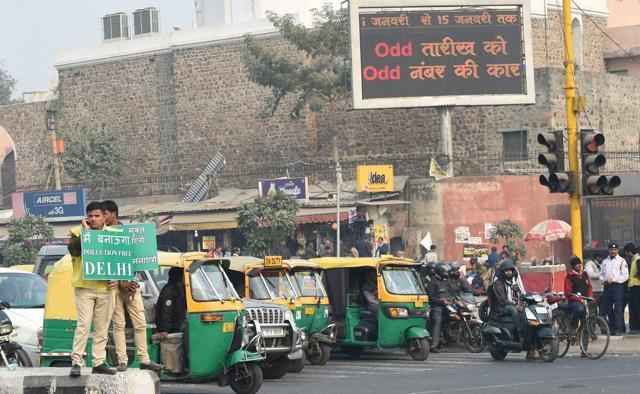 The traffic halts at a crossing as the trial of odd-even scheme came into effect in New Delhi on Friday. (PTI) The traffic halts at a crossing as the trial of odd-even scheme came into effect in New Delhi on Friday. (PTI)