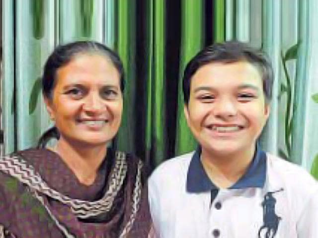 Jeevesh Joon, who has achieved the rare feat of clearing the Biology Olympiad, with his mother. (HT photo) Jeevesh Joon, who has achieved the rare feat of clearing the Biology Olympiad, with his mother. (HT photo)