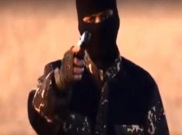 A video that surfaced on Sunday night shows a man dubbed as the “New Jehadi John” who holds a gun and mocks British PM Cameron for daring to “challenge the might” of the extremist group.(YouTube screengrab) A video that surfaced on Sunday night shows a man dubbed as the “New Jehadi John” who holds a gun and mocks British PM Cameron for daring to “challenge the might” of the extremist group.(YouTube screengrab)