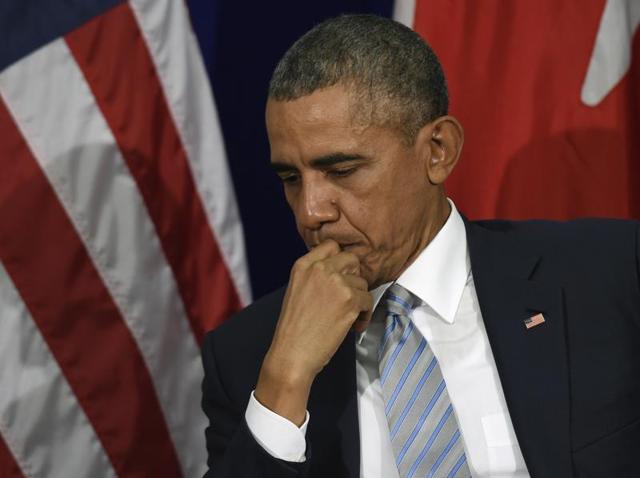 FILE - In this June 26, 2015 file photo, President Barack Obama sings "Amazing Grace" during services honouring the life of Rev. Clementa Pinckney, who was among those killed during the shootings at Charleston last year. The president has begun 2016 with clear intentions to tighten gun control laws, a move that has been highly divisive in the past. (AP Photo) FILE - In this June 26, 2015 file photo, President Barack Obama sings "Amazing Grace" during services honouring the life of Rev. Clementa Pinckney, who was among those killed during the shootings at Charleston last year. The president has begun 2016 with clear intentions to tighten gun control laws, a move that has been highly divisive in the past. (AP Photo)