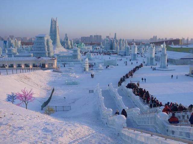 People wait in line at the China Ice and Snow World on the eve of the opening ceremony of the Harbin International Ice and Snow Festival . (AFP) People wait in line at the China Ice and Snow World on the eve of the opening ceremony of the Harbin International Ice and Snow Festival . (AFP)