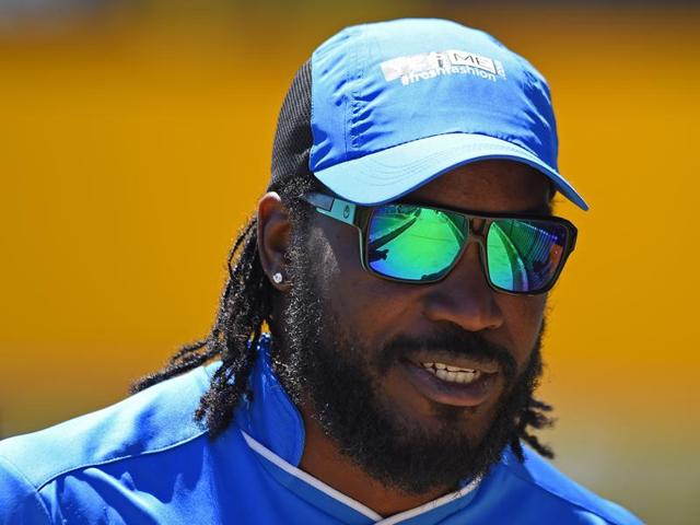 West Indies star Gayle apologised on January 5, 2016 after his "joke" flirt with a female television presenter was branded "disrespectful" and "inappropriate" by authorities.(AFP)