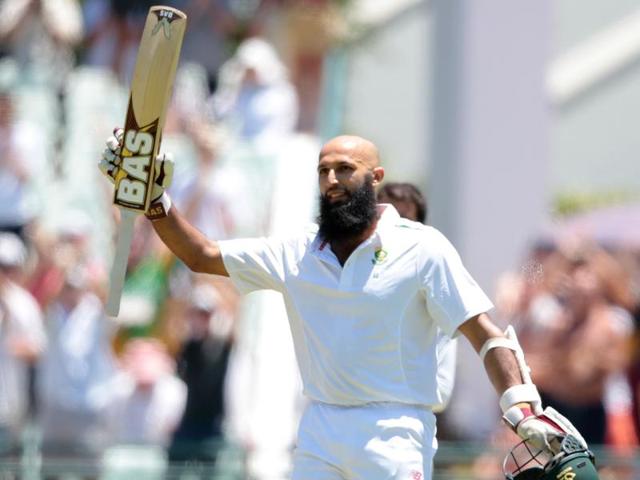 South African batsman and Captain Hashim Amla raises his bat as he celebrates scoring 200 during day 4 of the second Test match between England and South Africa. (AFP Photo) South African batsman and Captain Hashim Amla raises his bat as he celebrates scoring 200 during day 4 of the second Test match between England and South Africa. (AFP Photo)