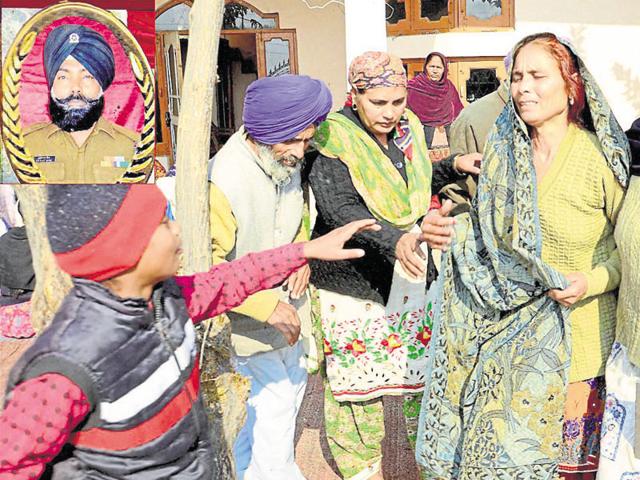 Kulwant Singh’s family members mourning at his house at Chak Sharif village near Gurdaspur. (PTI) Kulwant Singh’s family members mourning at his house at Chak Sharif village near Gurdaspur. (PTI)