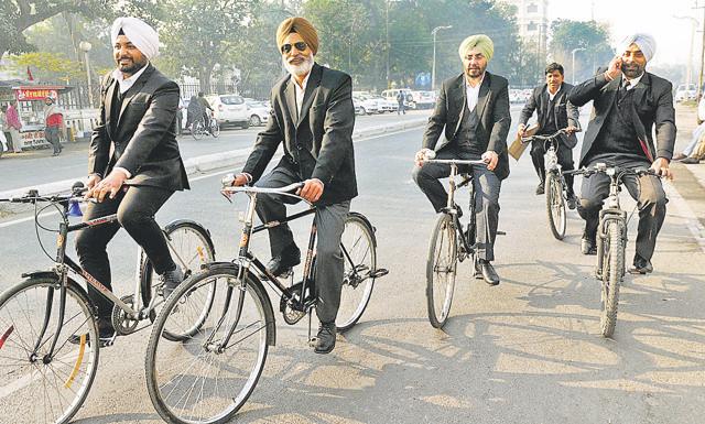 Members of the District Bar Association, Patiala on bicycles in Patiala on Wednesday. (Bharat Bhushan/HT Photo)