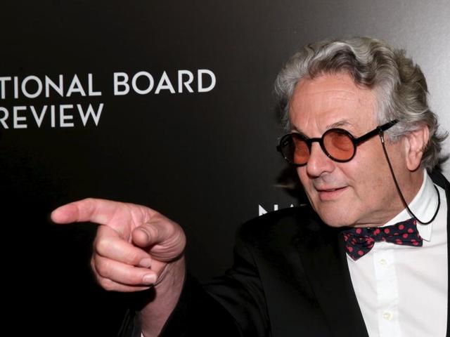 Mad Max: Fury Road director George Miller gestures to the photographers at The National Board of Review Gala in New York. (REUTERS) 