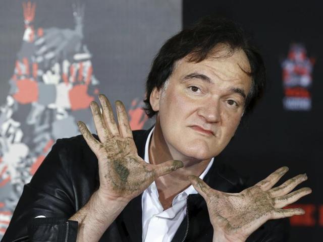 Director Quentin Tarantino poses after placing his handprints in cement in the forecourt of the TCL Chinese theatre in Hollywood, California. (REUTERS) Director Quentin Tarantino poses after placing his handprints in cement in the forecourt of the TCL Chinese theatre in Hollywood, California. (REUTERS)