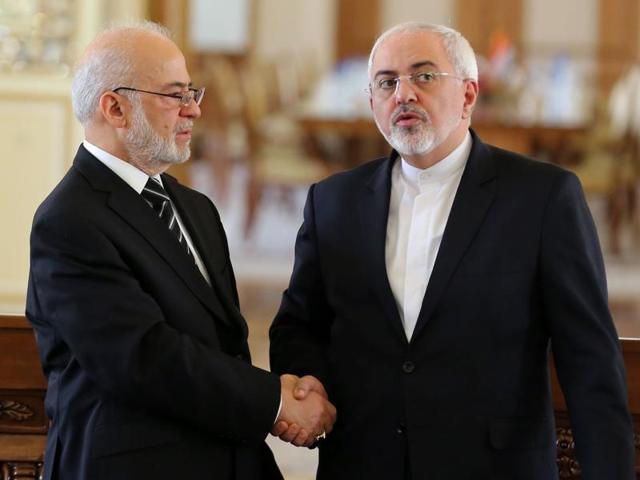 Iraqi foreign minister Ibrahim al-Jaafari (L) shakes hands with his Iranian counterpart Mohammad Javad Zarif after a press conference in Tehran on Wednesday. Jaafari held talks in Tehran with a focus on the crisis between Saudi Arabia and Iran as international concern mounts. (AFP) Iraqi foreign minister Ibrahim al-Jaafari (L) shakes hands with his Iranian counterpart Mohammad Javad Zarif after a press conference in Tehran on Wednesday. Jaafari held talks in Tehran with a focus on the crisis between Saudi Arabia and Iran as international concern mounts. (AFP)