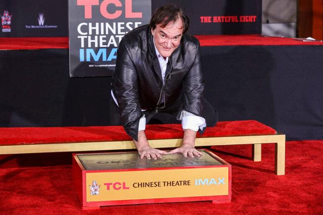 Quentin Tarantino places his hand in cement at a hand and footprint ceremony at the TCL Chinese Theatre. (AP) Quentin Tarantino places his hand in cement at a hand and footprint ceremony at the TCL Chinese Theatre. (AP)
