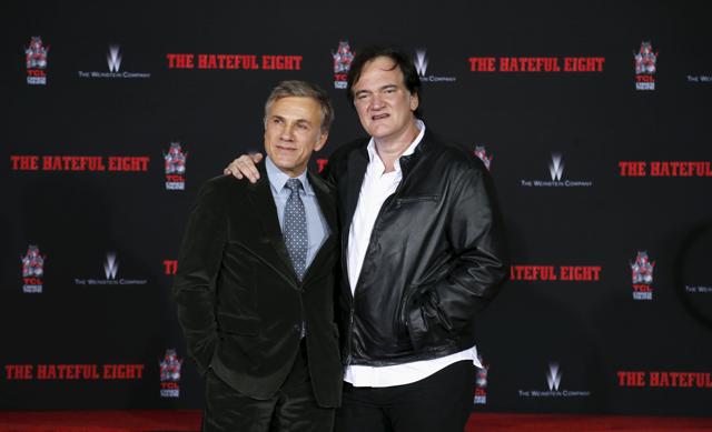 Director Quentin Tarantino poses with actor Christoph Waltz after placing his hand and footprints in cement in the forecourt of the TCL Chinese theatre in Hollywood. (REUTERS) Director Quentin Tarantino poses with actor Christoph Waltz after placing his hand and footprints in cement in the forecourt of the TCL Chinese theatre in Hollywood. (REUTERS)