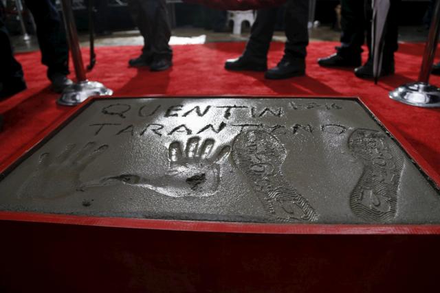 The hand, footprints and signature of director Quentin Tarantino in cement are pictured in the forecourt of the TCL Chinese theatre in Hollywood. (REUTERS) The hand, footprints and signature of director Quentin Tarantino in cement are pictured in the forecourt of the TCL Chinese theatre in Hollywood. (REUTERS)