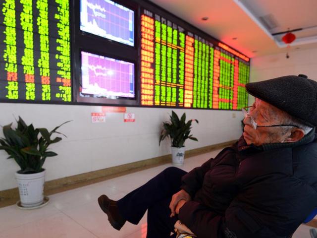 Trading on China’s stock markets were suspended for the rest of the day, for the second time this week, as a new circuit-breaking mechanism was tripped less than half an hour after the opening minutes. (AFP) Trading on China’s stock markets were suspended for the rest of the day, for the second time this week, as a new circuit-breaking mechanism was tripped less than half an hour after the opening minutes. (AFP)