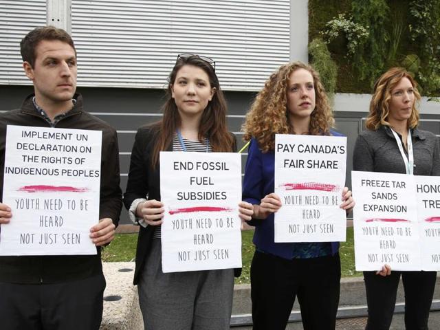 Canadian Youth Delegation members hold placards with messages calling for better engagement with young people concerning climate issues during the World Climate Change Conference 2015 (COP21) in Le Bourget near Paris in December. (Reuters File) Canadian Youth Delegation members hold placards with messages calling for better engagement with young people concerning climate issues during the World Climate Change Conference 2015 (COP21) in Le Bourget near Paris in December. (Reuters File)
