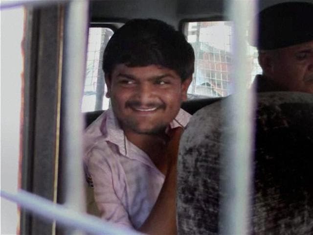 Convener of Patidar Anamat Andolan Samiti Hardik Patel being taken to a court in Surat on Monday. (PTI) Convener of Patidar Anamat Andolan Samiti Hardik Patel being taken to a court in Surat on Monday. (PTI)