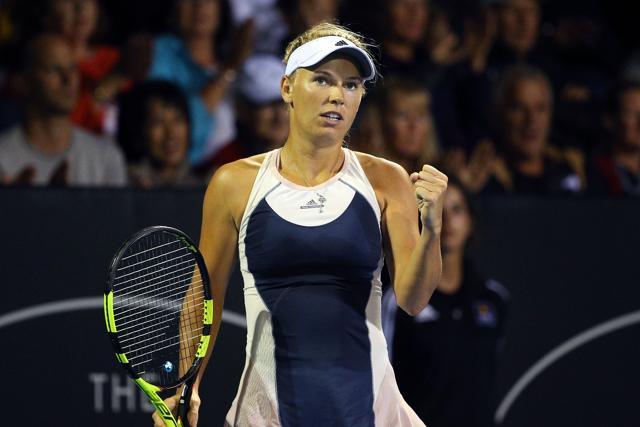 Caroline Wozniacki celebrates winning a point against Alexandra Dulgheru of Romania with a fist pump. (AFP Photo) Caroline Wozniacki celebrates winning a point against Alexandra Dulgheru of Romania with a fist pump. (AFP Photo)