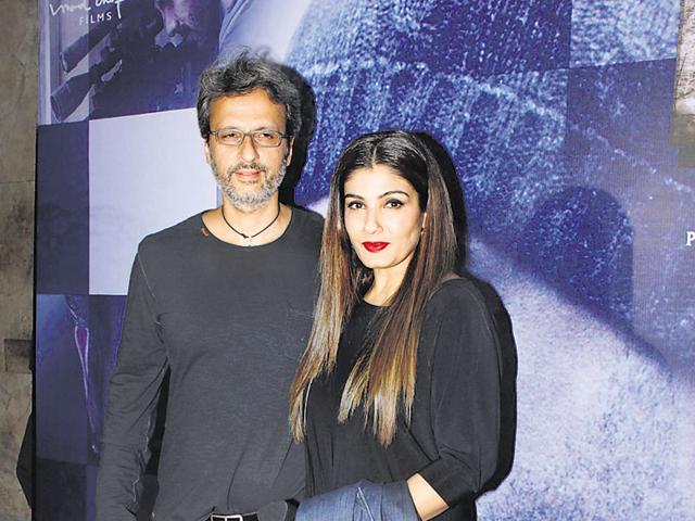 Raveena Tandon poses with husband Anil Thadani at the special screening of Wazir. (photos: shakti yadav) 
