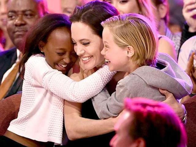 Angelina Jolie with daughters Zahara and Shiloh. Angelina Jolie with daughters Zahara and Shiloh.