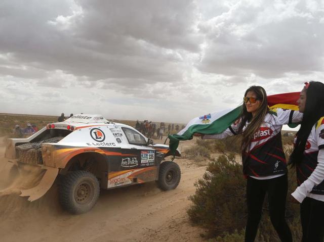 Buggy driver Eric Bernard and co-pilot Alexandre Vigneau, both from France, race during the fifth stage of the Dakar Rally. (AP Photo)