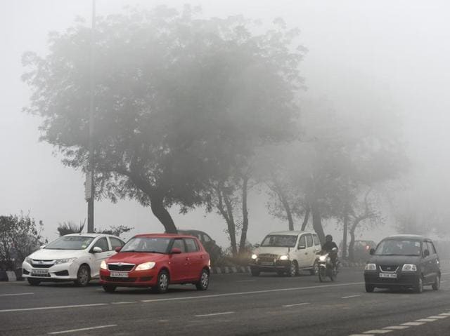 Met officials said the dense fog was due to a combination of high humidity and low wind speed. (Sushil Kumar/HT photo)
