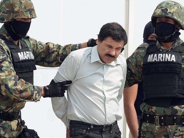 Mexican drug trafficker Joaquin Guzman Loera or "El Chapo’ is escorted by marines as he is presented to the press on February 22, 2014 in Mexico City. (AFP File Photo) Mexican drug trafficker Joaquin Guzman Loera or "El Chapo’ is escorted by marines as he is presented to the press on February 22, 2014 in Mexico City. (AFP File Photo)