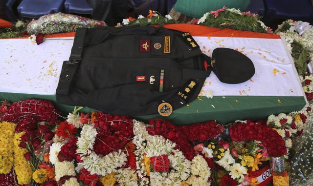 The uniform of National Security Guard commando Niranjan Kumar, who was among those killed in the attack on the Pathankot air force base is placed on his coffin draped in the Indian flag, in Bangalore. (AP Photo) The uniform of National Security Guard commando Niranjan Kumar, who was among those killed in the attack on the Pathankot air force base is placed on his coffin draped in the Indian flag, in Bangalore. (AP Photo)