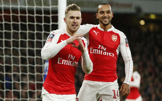 Aaron Ramsey celebrates scoring the second goal for Arsenal with Theo Walcott. (Reuters Photo) Aaron Ramsey celebrates scoring the second goal for Arsenal with Theo Walcott. (Reuters Photo)