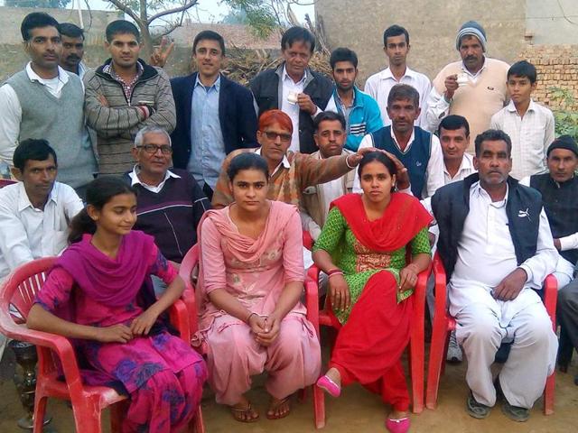 Yogesh Kumari Gaat (centre) after being elected the sarpanch at Ludesar village in Sirsa district on Saturday.(HT file photo) Yogesh Kumari Gaat (centre) after being elected the sarpanch at Ludesar village in Sirsa district on Saturday.(HT file photo)