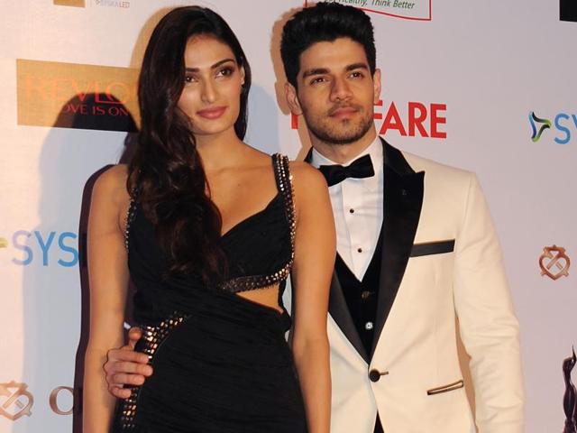 The new generation of Bollywood -- Athiya Shetty and Suraj Pancholi -- oblige shutterbugs at the pre-awards party. (AFP) The new generation of Bollywood -- Athiya Shetty and Suraj Pancholi -- oblige shutterbugs at the pre-awards party. (AFP)