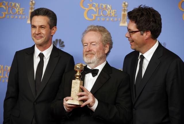 Director Ridley Scott (C), producers Simon Kinberg (L) and Michael Scheafer, pose with the award for Best Motion Picture - Musical or Comedy for The Martian during the 73rd Golden Globe Awards in Beverly Hills, California January 10, 2016. (REUTERS) Director Ridley Scott (C), producers Simon Kinberg (L) and Michael Scheafer, pose with the award for Best Motion Picture - Musical or Comedy for The Martian during the 73rd Golden Globe Awards in Beverly Hills, California January 10, 2016. (REUTERS)