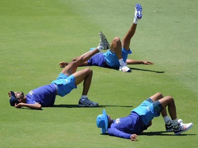 India's cricketers warm-up prior to the start of the one-day cricket match between India and a Western Australian XI in Perth. (AFP Photo)