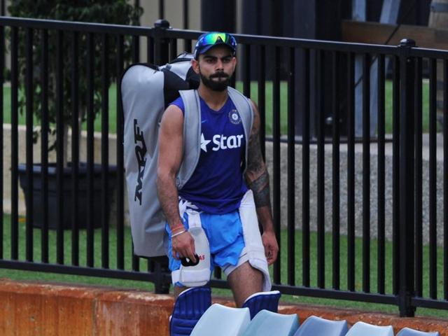 India's Virat Kohli returns to the changing rooms after batting in the practice nets. (AFP Photo)