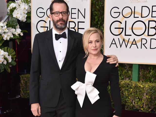 Patricia Arquette had her dress right but then added that giant bow to it. She looks less of a Hollywood star and more of a Christmas gift. (Jordan Strauss/Invision/AP) 