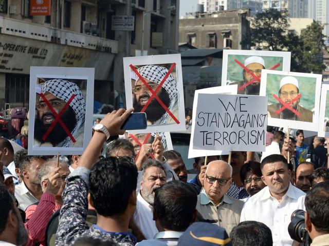 Protesters carry photographs of the chief of Jaish-e-Mohammed, Maulana Masood Azhar (L) and chief of Pakistan's outlawed Islamic hardline Jamaat ud Dawa (JD), Hafiz Mohammad Saeed (R) during a protest against the attack on the air force base in Pathankot. (AFP) Protesters carry photographs of the chief of Jaish-e-Mohammed, Maulana Masood Azhar (L) and chief of Pakistan's outlawed Islamic hardline Jamaat ud Dawa (JD), Hafiz Mohammad Saeed (R) during a protest against the attack on the air force base in Pathankot. (AFP)