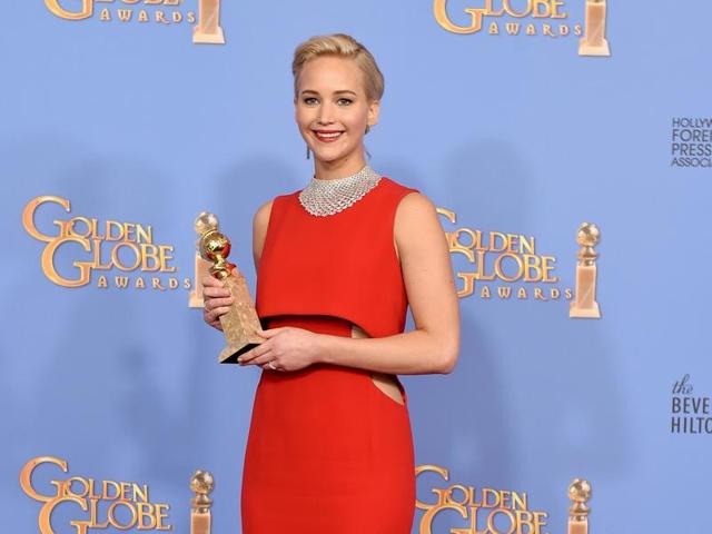 Jennifer Lawrence poses with the award for best performance by an actress in a motion picture - musical or comedy for Joy at the 73rd annual Golden Globe Awards on Sunday, Jan. 10, 2016, at the Beverly Hilton Hotel in Beverly Hills, Calif. (AP) Jennifer Lawrence poses with the award for best performance by an actress in a motion picture - musical or comedy for Joy at the 73rd annual Golden Globe Awards on Sunday, Jan. 10, 2016, at the Beverly Hilton Hotel in Beverly Hills, Calif. (AP)