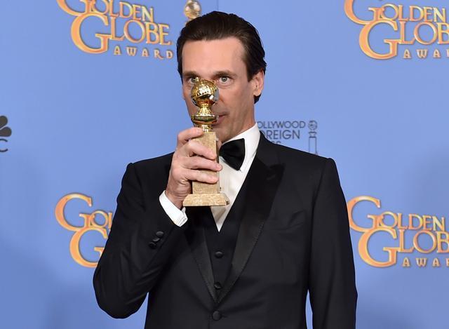 Jon Hamm poses in the press room with the award for best performance by an actor in a TV series - drama for Mad Men. (Jordan Strauss/Invision/AP) Jon Hamm poses in the press room with the award for best performance by an actor in a TV series - drama for Mad Men. (Jordan Strauss/Invision/AP)