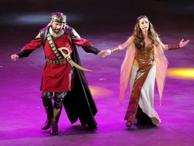 Lebanese actor Ghassan Saliba  and singer Balqees Ahmed Fathi perform in the Al Faris or The Knight, a musical set to poetry penned by Dubai's monarch Sheikh Mohammed bin Rashid al-Maktoum. (REUTERS) 