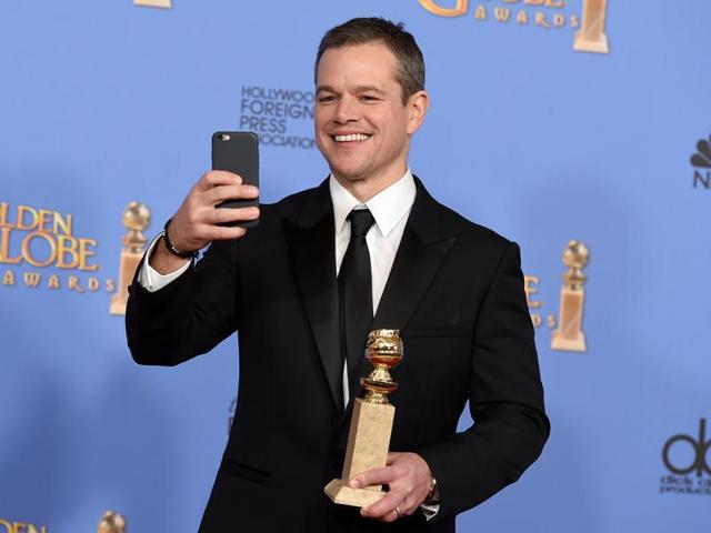 Matt Damon poses in the press room with the award for best performance by an actor in a motion picture - musical or comedy for The Martian at the 73rd annual Golden Globe Awards on Sunday, Jan. 10, 2016, at the Beverly Hilton Hotel in Beverly Hills, Calif. (AP) Matt Damon poses in the press room with the award for best performance by an actor in a motion picture - musical or comedy for The Martian at the 73rd annual Golden Globe Awards on Sunday, Jan. 10, 2016, at the Beverly Hilton Hotel in Beverly Hills, Calif. (AP)