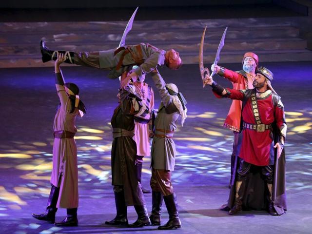 Cast members act in Al Faris or The Knight, a musical based on Dubai monarch’s poetry. (REUTERS) 