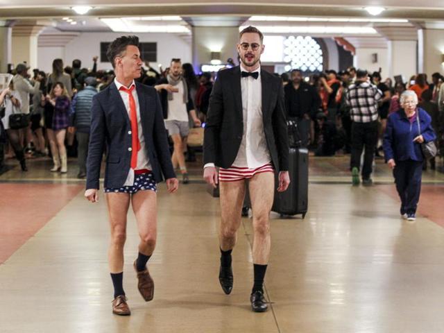 Scotland Beaver, left, and Mathew Spencer in the annual 'No Pants Metro Ride' walk in the Union Station. (AP) Scotland Beaver, left, and Mathew Spencer in the annual 'No Pants Metro Ride' walk in the Union Station. (AP)