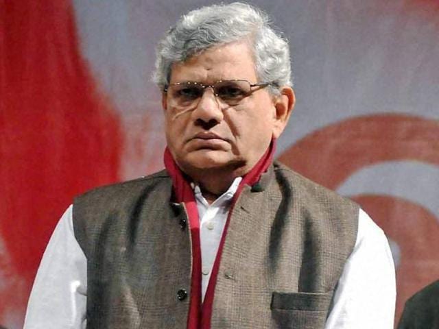 CPI(M) General Secretary Sitaram Yechury observing one minute silence for the militant attack at Pathankot. (PTI Photo)