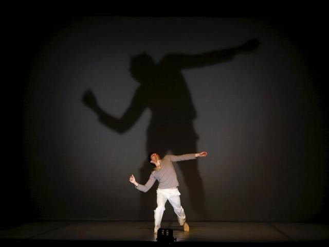 A dancer of Ballet de l'Opera Theatre De Metz Metropole of France takes part in "Chancel", a contemporary dance production. (REUTERS)