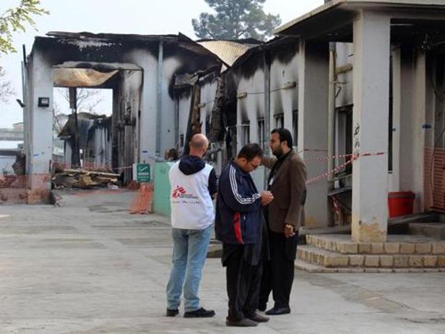 Staff members gather outside the damaged Medecins Sans Frontieres (MSF) hospital in Afghanistan's city of Kunduz. The US airstrike on the hospital earlier in October 2015 was “caused primarily by human error”. (AFP File Photo) Staff members gather outside the damaged Medecins Sans Frontieres (MSF) hospital in Afghanistan's city of Kunduz. The US airstrike on the hospital earlier in October 2015 was “caused primarily by human error”. (AFP File Photo)