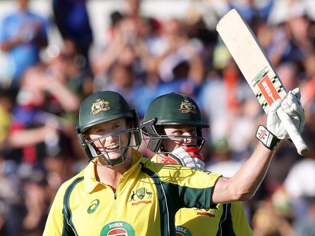 Australia's George Bailey celebrates with team mate Steve Smith after making his century. (Reuters Photo)