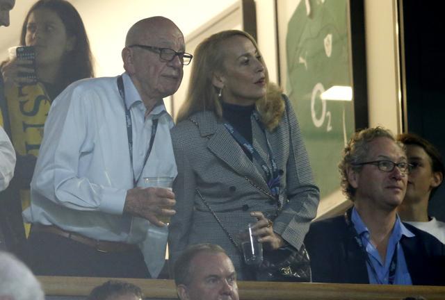 Rupert Murdoch stands with model Jerry Hall during the Rugby World Cup final. (AP) Rupert Murdoch stands with model Jerry Hall during the Rugby World Cup final. (AP)